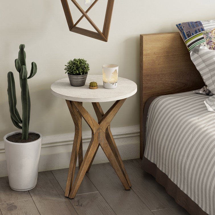 Round white side table deals with wooden legs